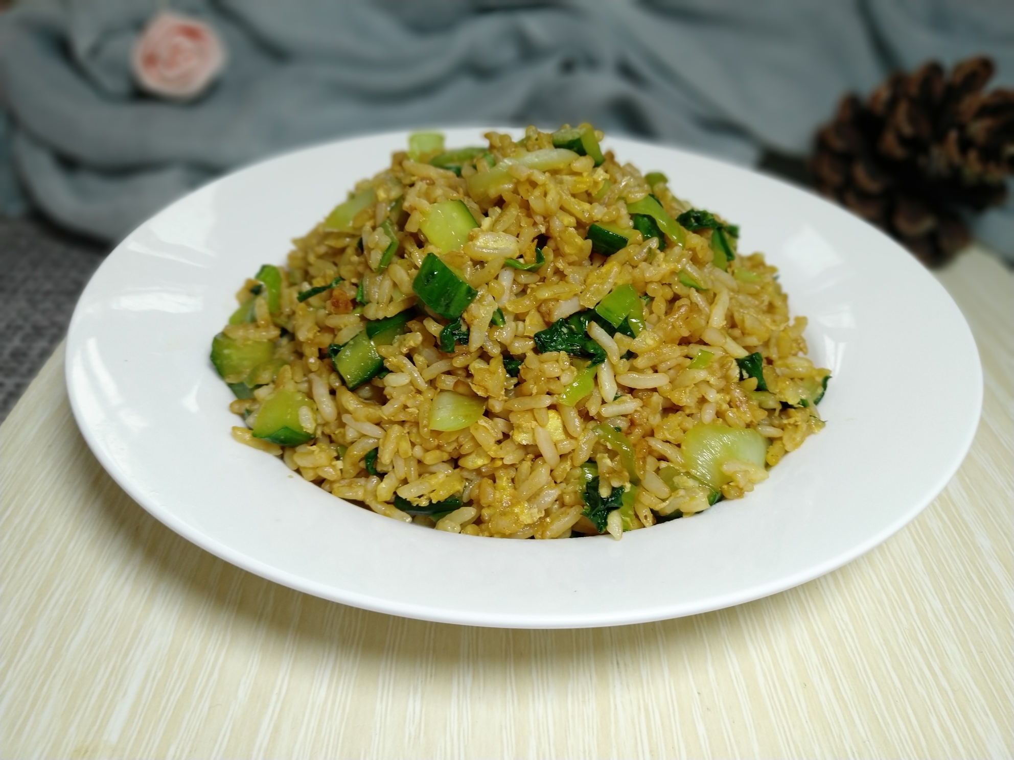 Cucumber, green vegetables and egg fried rice