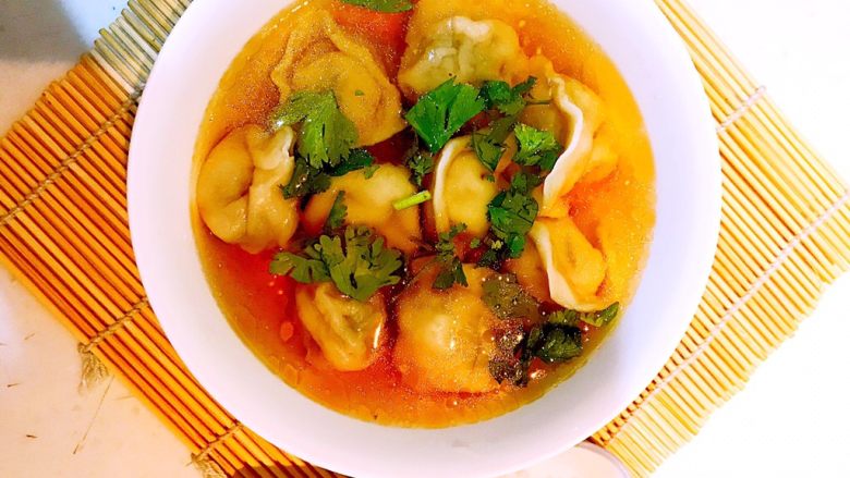 Spiced onion and meat wontons in clear soup