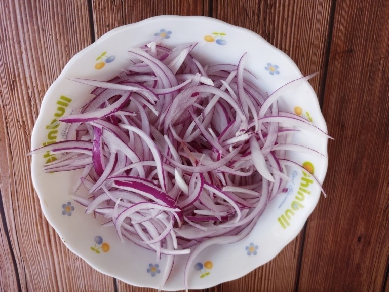 Onions mixed with shredded potatoes