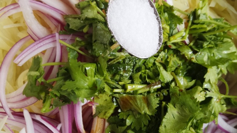 Onions mixed with shredded potatoes