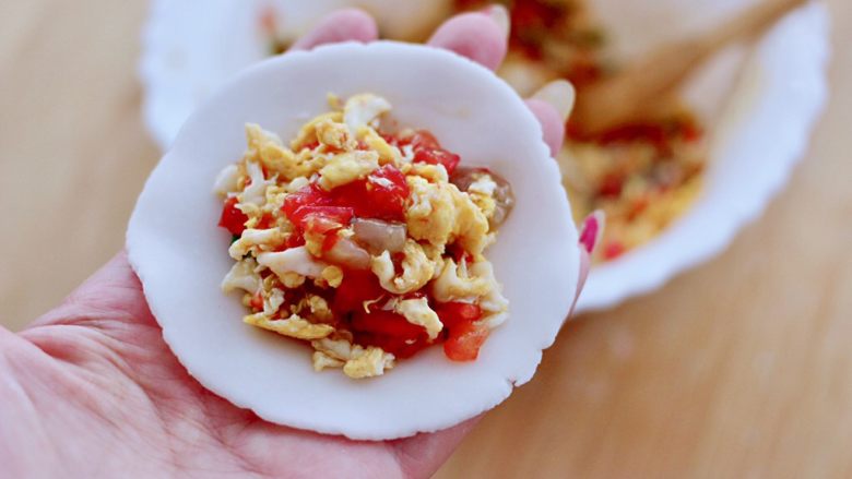 Tomato, shrimp, egg and crystal steamed dumplings