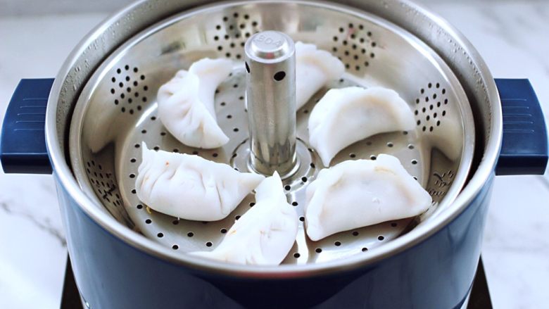 Tomato, shrimp, egg and crystal steamed dumplings