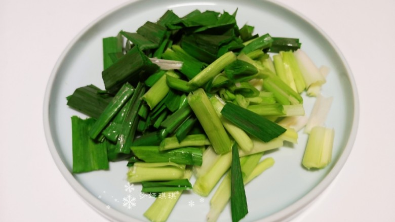 Dry garlic sprouts until fragrant