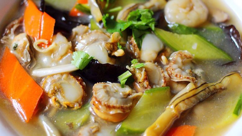 Scallop, seafood and vegetable soup