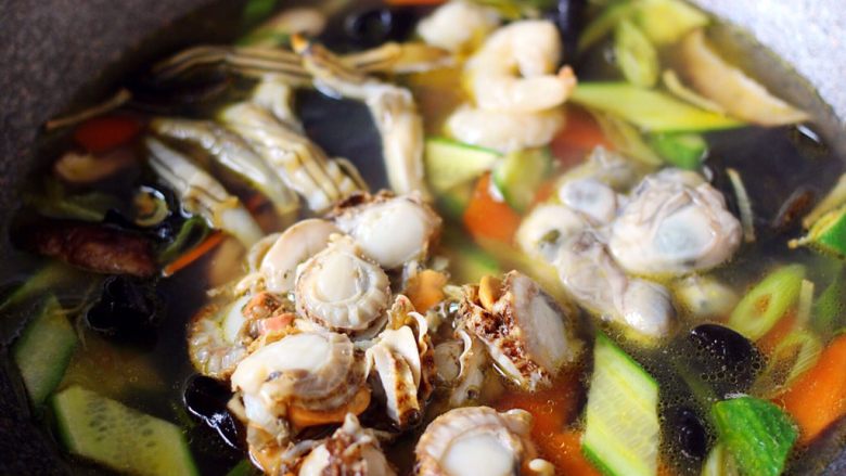 Scallop, seafood and vegetable soup