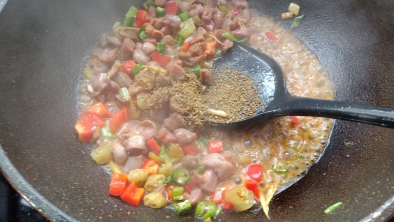 Stir-fried chicken gizzards with sansho pepper and cumin