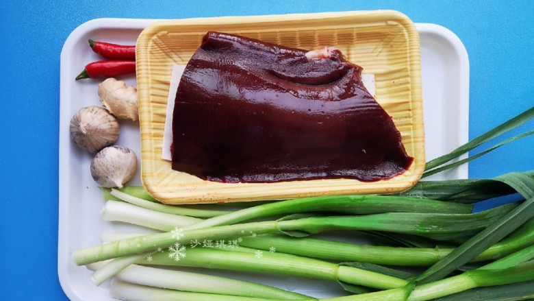 Stir-fried pork liver with garlic sprouts