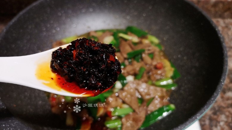 Stir-fried pork liver with garlic sprouts