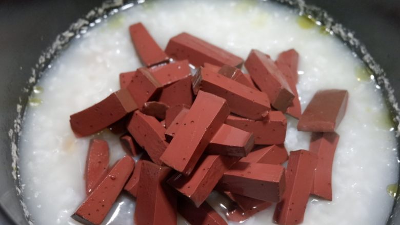 Pig's blood and scallop porridge