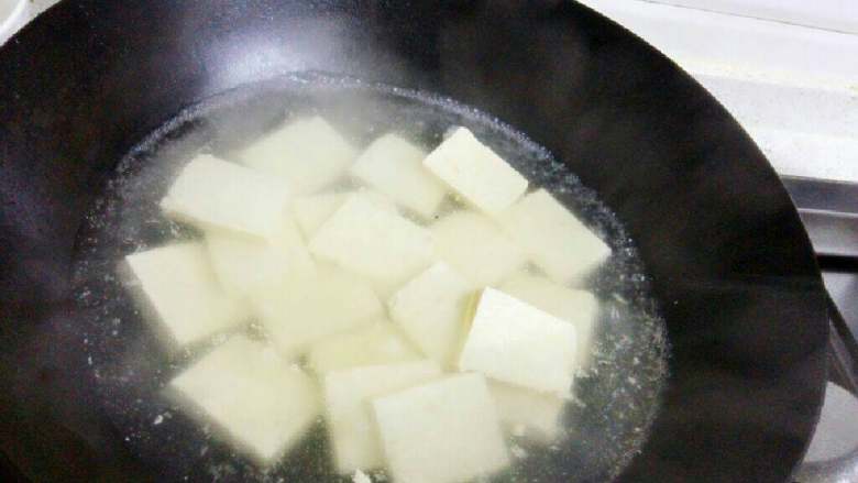 Tomato, tofu and fish fillet soup