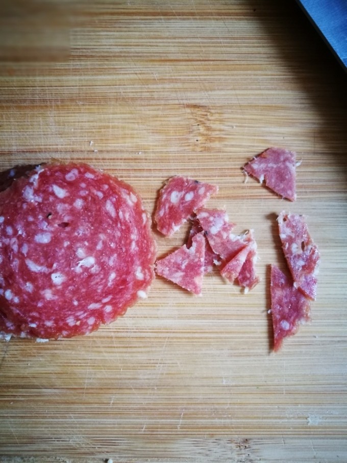 Salami and white sausage and bacon thin-crust pizza (pan version)