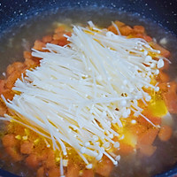 Illustration of how to make tomato and enoki mushroom tofu soup 7