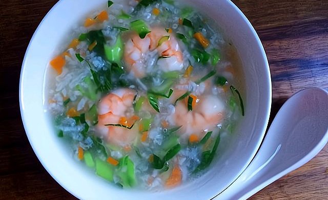 Carrot, green vegetables and shrimp porridge