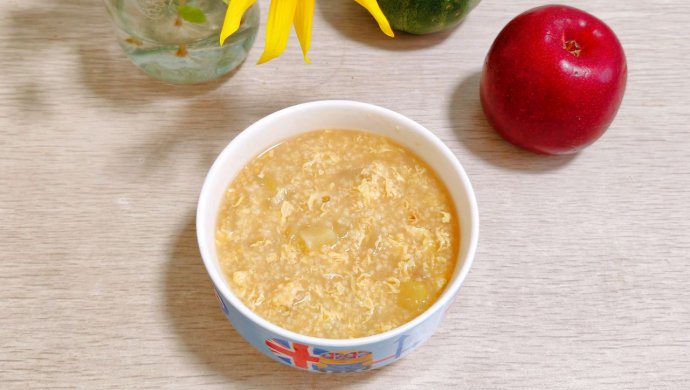 Apple egg millet porridge