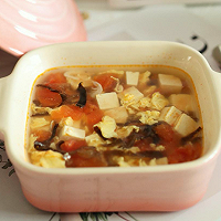 Autumn baby's stomach-warming calcium supplement soup: tomato fungus and tofu soup Illustration of how to do it 8