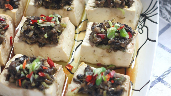 Steamed tofu with olives, vegetables and minced meat