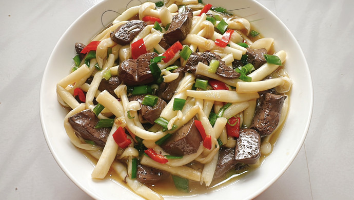 Stir-fried duck blood with seafood and mushrooms