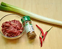 Illustration of how to make lamb stir-fried with cumin and green onion 1