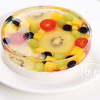 Illustration of how to make white jelly fruit cake 11