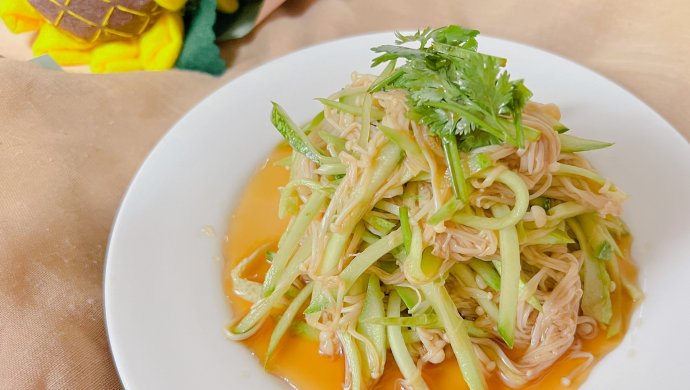 Cucumber mixed with enoki mushrooms