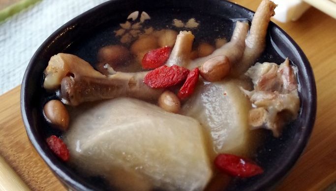 Chicken feet and peanut soup