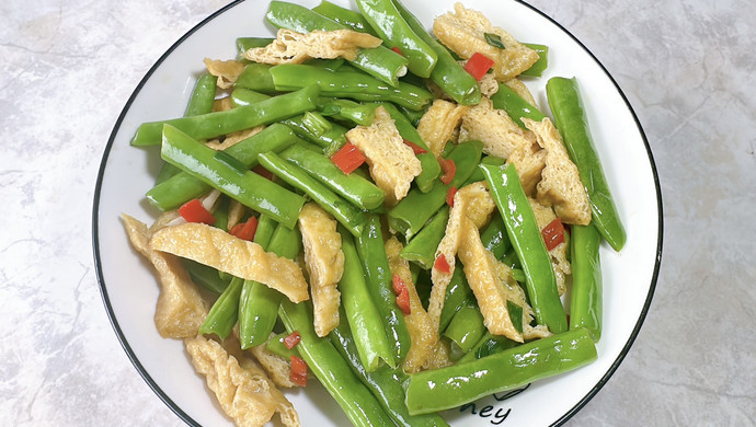 Stir-fried green beans and tofu