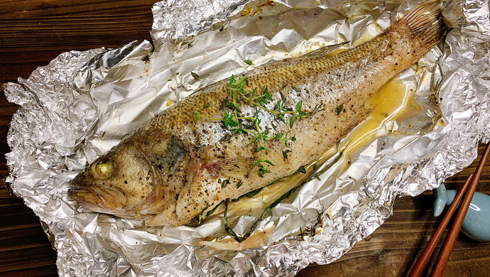 Tinfoil grilled seabass